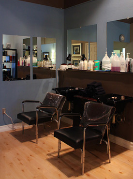 The Looking Glass Salon can do high lights, low lights, all over color and perms